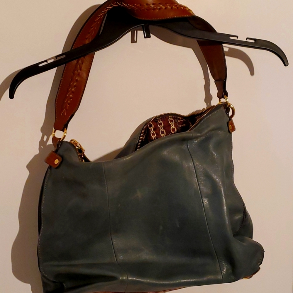 SIGNATUTE SERIES Tignanello Blue purse with tassels  zippers